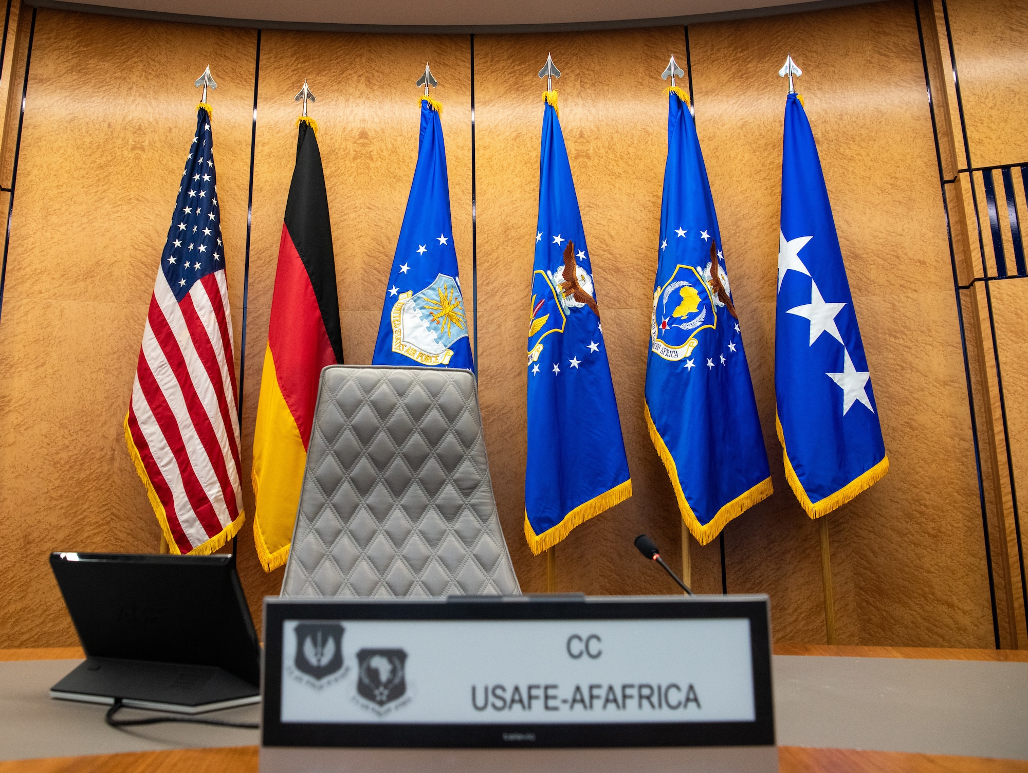 Flags are displayed in conference room.