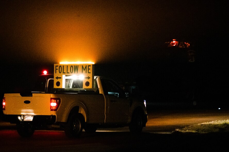 A ground crew vehicle guides a U.S. Air Force B-52H Stratofortress assigned to the 69th Expeditionary Bomb Squadron after landing in support of Bomber Task Force 25-2 at RAF Fairford, England, Feb. 11, 2025. NATO Allied and partner air forces can be deployed anytime, anywhere. BTF 25-2 is a demonstration of cooperation, collaboration, integration, and solidarity to promote peace and security. (U.S. Air Force photo by Airman 1st Class Luis Gomez)