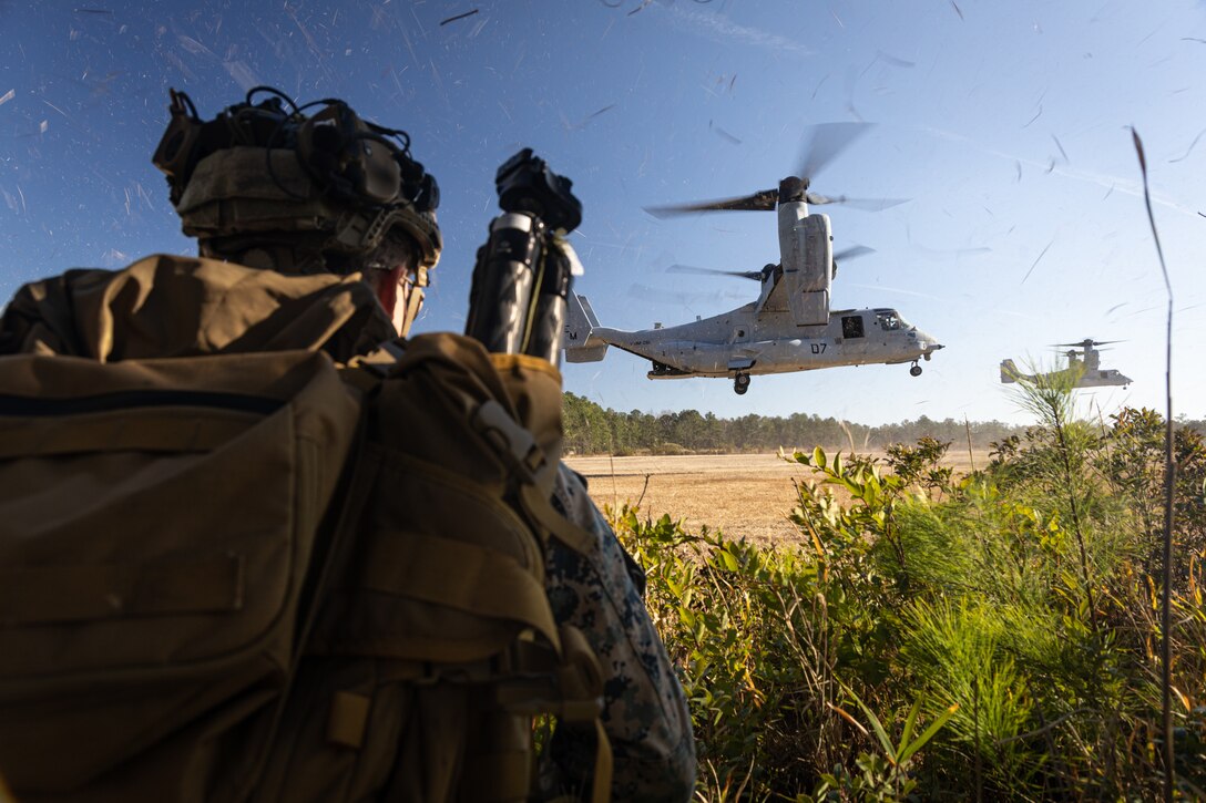 U.S. Marine Corps MV-22 Osprey aircraft with Marine Medium Tiltrotor Squadron 261 (VMM-261), prepare to land during tactical recovery of aircraft and personnel (TRAP) training at Camp Lejeune, North Carolina, Feb. 4, 2025. The ability to conduct TRAP and personnel recovery missions allows the 26th Marine Expeditionary Unit and its forces to rapidly respond to downed aircraft, and rescue people from isolated or hazardous locations. (U.S. Marine Corps photo by Lance Cpl. Osmar VasquezHernandez)