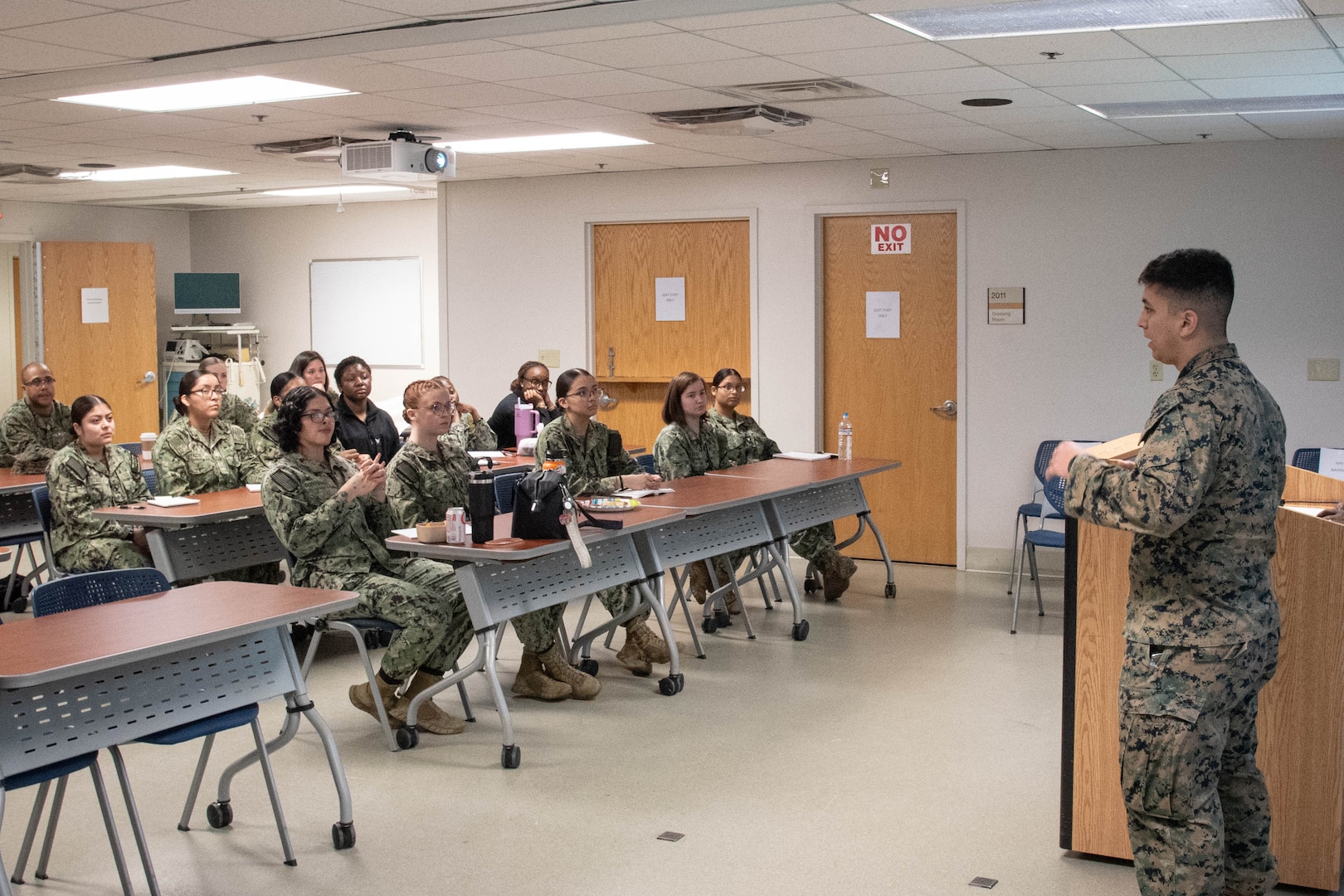 Hospital Corpsman First Class Michael Barros, right, shares his application and acceptance experience into the U.S. Navy’s Medical Service Corps Inservice Procurement Program to fellow Sailors during a Commissioning Lunch and Learn held February 13, 2025 aboard Naval Health Clinic Cherry Point.  The mentorship session provided information to clinic Sailors about commissioning opportunities.