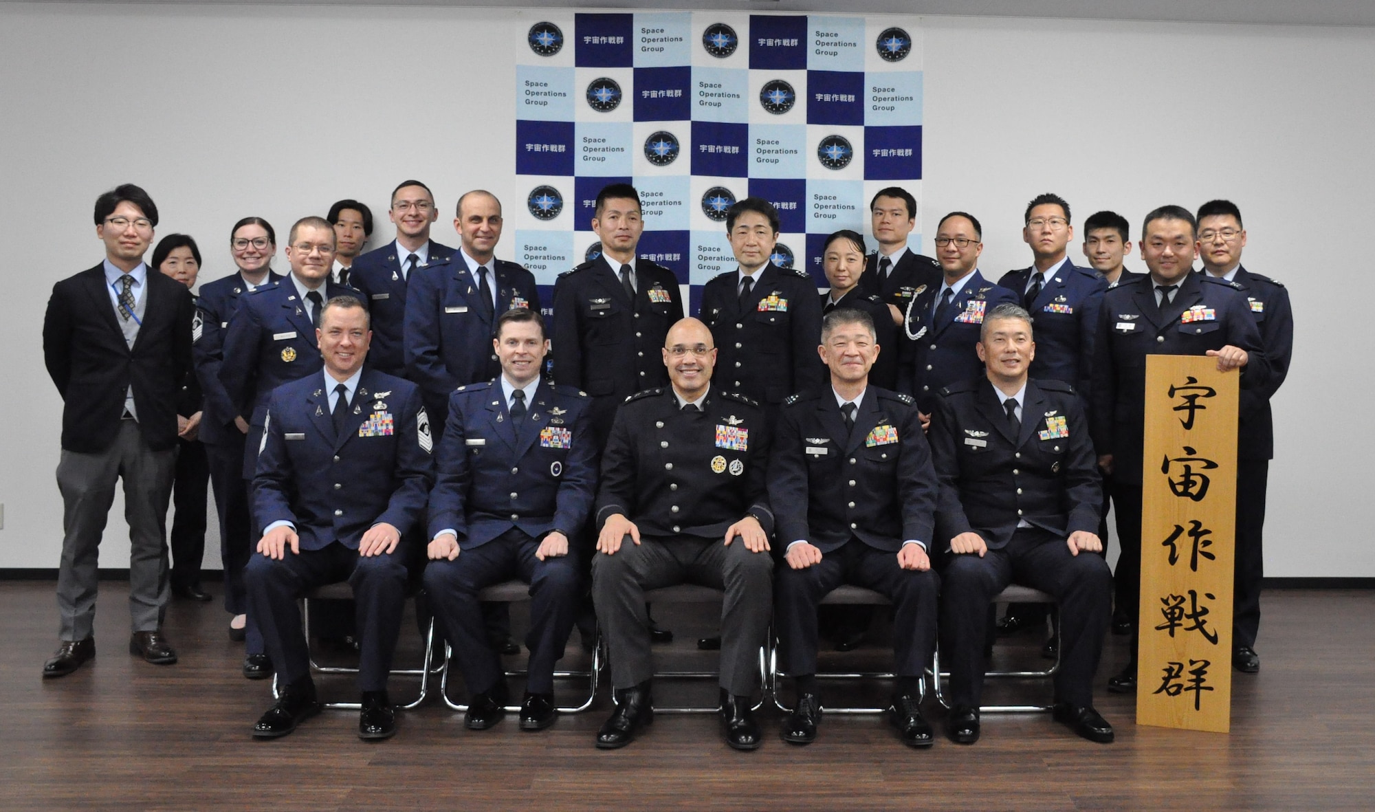 U.S. Space Force Lt. Gen. David N. Miller Jr., front middle, commander of U.S. Space Operations Command (SpOC), and Guardians assigned to SpOC and U.S. Space Forces Japan, pose for a photo with members of the Japanese Air Self-Defense Force’s Space Operations Group at Fuchu Air Base, Japan, Feb. 10, 2025.