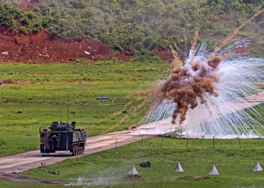 Figure 4. ZBD-05 amphibious assault vehicle firing smoke shells