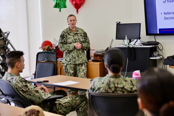 Hospital Corpsman 1st Class Courtney Smith instructs hospital corpsmen during the Sick Call Screener Course (SCSC) at Naval Medical Readiness and Training Command (NMRTC) Twentynine Palms on Feb. 12, 2025. The course, developed by NMRTC Twentynine Palms leadership, enhances medical proficiency by training corpsmen to triage and evaluate acute patients under provider supervision. By implementing the SCSC, the Adult Medical Care Clinic (AMCC) has significantly improved access to care, reducing appointment wait times from six weeks to seven days and ensuring Marines receive timely medical attention to maintain operational readiness (U.S. Navy photo by Christopher C. Jones, NHTP/NMRTC Twentynine Palms public affairs officer).