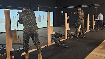 Dr. Brad Fawver and collaborators from the Brazilian Army Research Institute of Physical Fitness (IPCFEx) use an engagement skills trainer (EST). (Courtesy Photo)