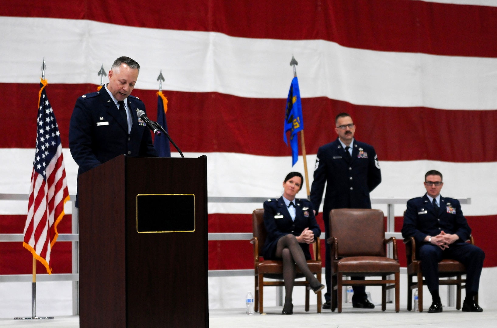 Nebraska Air National Guard Lt. Col. Samuel Schneider addresses the audience after relinquishing command of the Nebraska Air National Guard's 170th Maintenance Support Squadron during a change of command ceremony held Jan. 30, 2025, at Offutt Air Force Base. Schneider had served as the first commander of the new maintenance support squadron since April 2022. (Nebraska National Guard photo by Kevin Hynes).