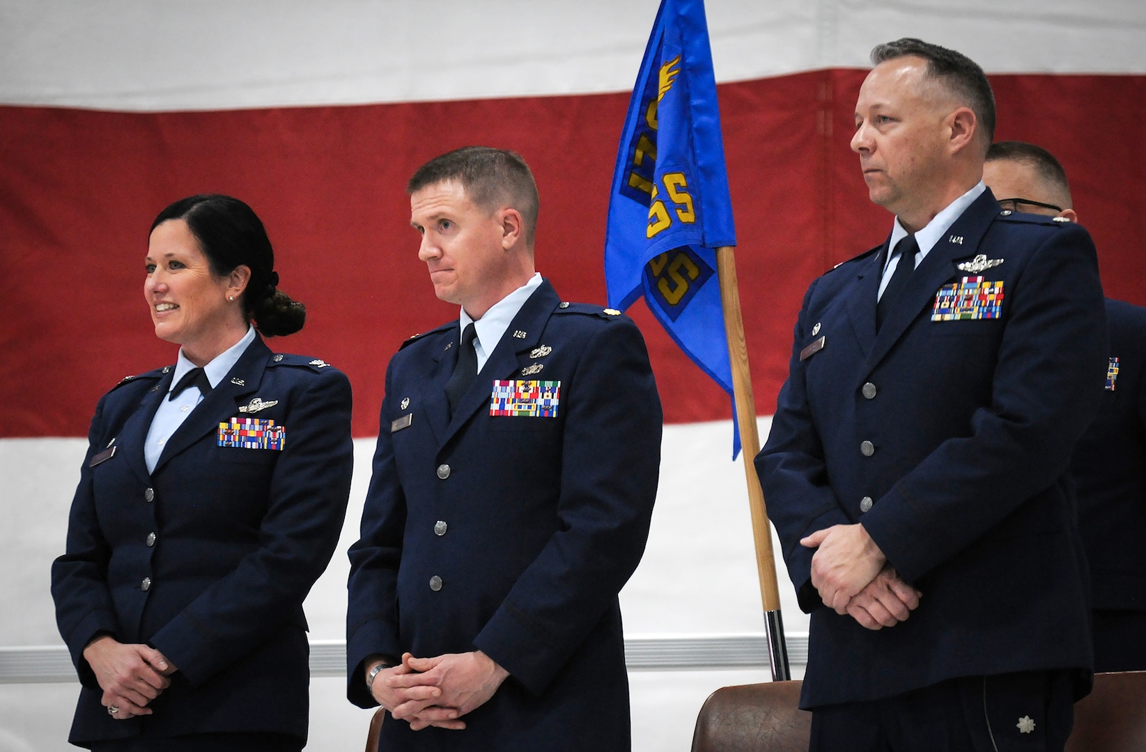 (From left) Nebraska Air National Guard Col. Wendy Squarcia, Maj. Maj. Jordan Jacobs and Lt. Col. Samuel Schneider stand next to each other during the change of command ceremony for Nebraska Air National Guard's 170th Maintenance Support Squadron, Jan. 30, 2025, at Offutt Air Force Base. The 170th Maintenance Support Squadron is a new Nebraska Air National Guard unit that provides maintenance support for the active Air Force's 55th Maintenance Group at Offutt Air Force Base. (Nebraska National Guard photo by Kevin Hynes).