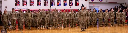 Soldiers from Company D, 2nd Battalion, 130th Infantry Regiment, based in Mount Vernon, stand in formation during the unit’s mobilization ceremony Feb. 8.