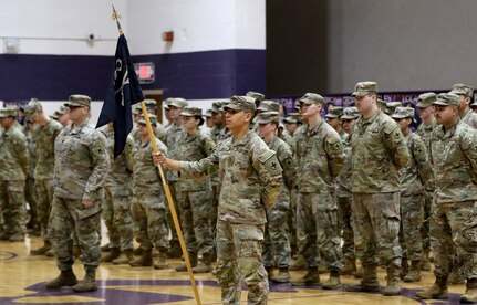 Soldiers from Company C, 2nd Battalion, 130th Infantry Regiment, based in Litchfield, stand in formation during the unit’s mobilization ceremony Feb. 9.