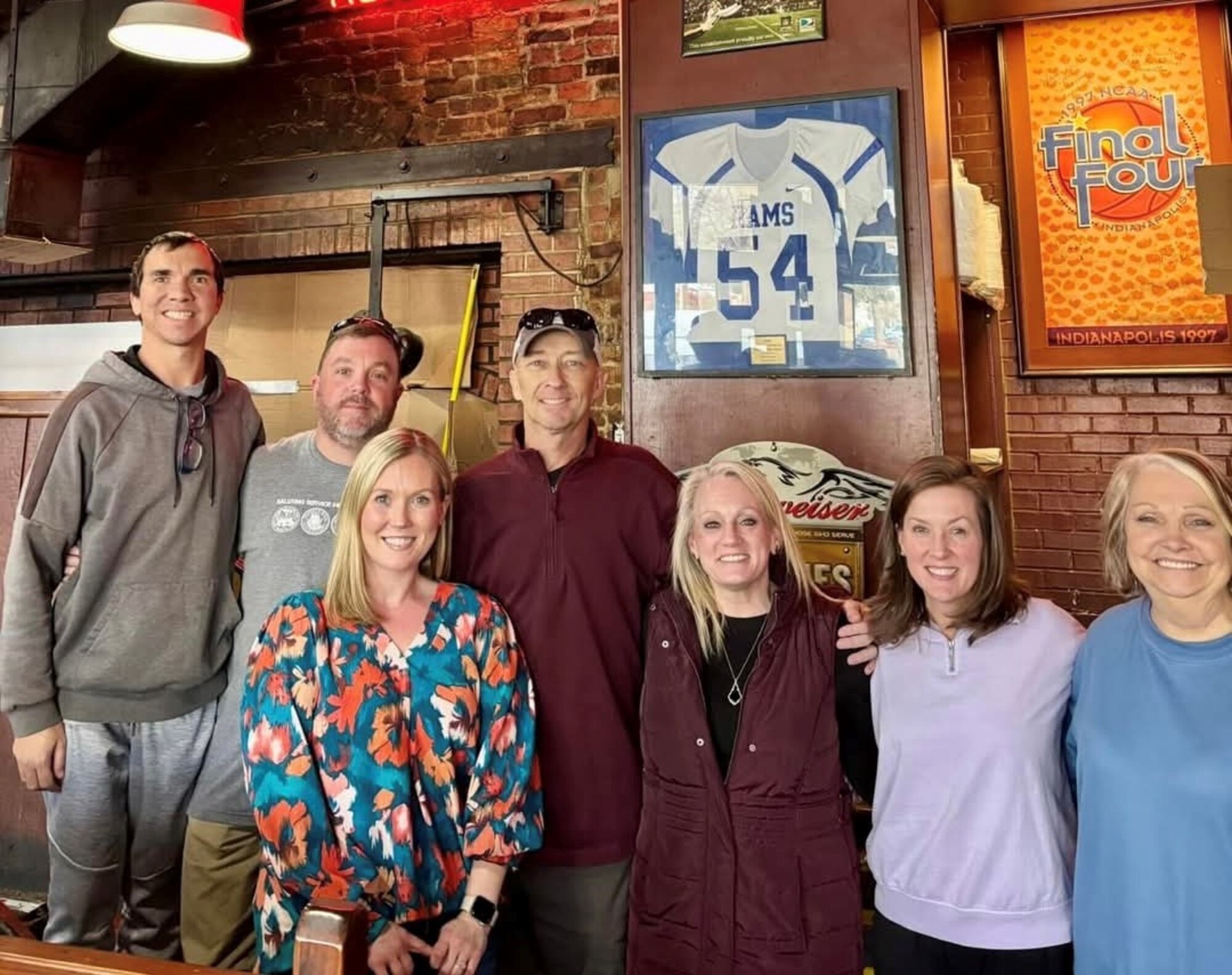 Chief Master Sgt. Kevin Sargent (middle with maroon shirt) and family visit with Master Sgt. Ron Bohl (second from left) and his family at a Tuscaloosa restaurant, celebrating one month after a successful kidney transplant for Sargent and Bohl’s brother, Matthew. Master Sgt. Ron Bohl, a Mississippi Air National Guardsman, donated a kidney to Chief Master Sgt. Kevin Sargent, an Alabama Air National Guardsman, through a paired donor program, after Bohl was found not to be a match for his brother, who ultimately received a kidney from another donor, Nicole Brannon (second from right), in a successful kidney swap (photo provided by Master Sgt. Ron Bohl)
