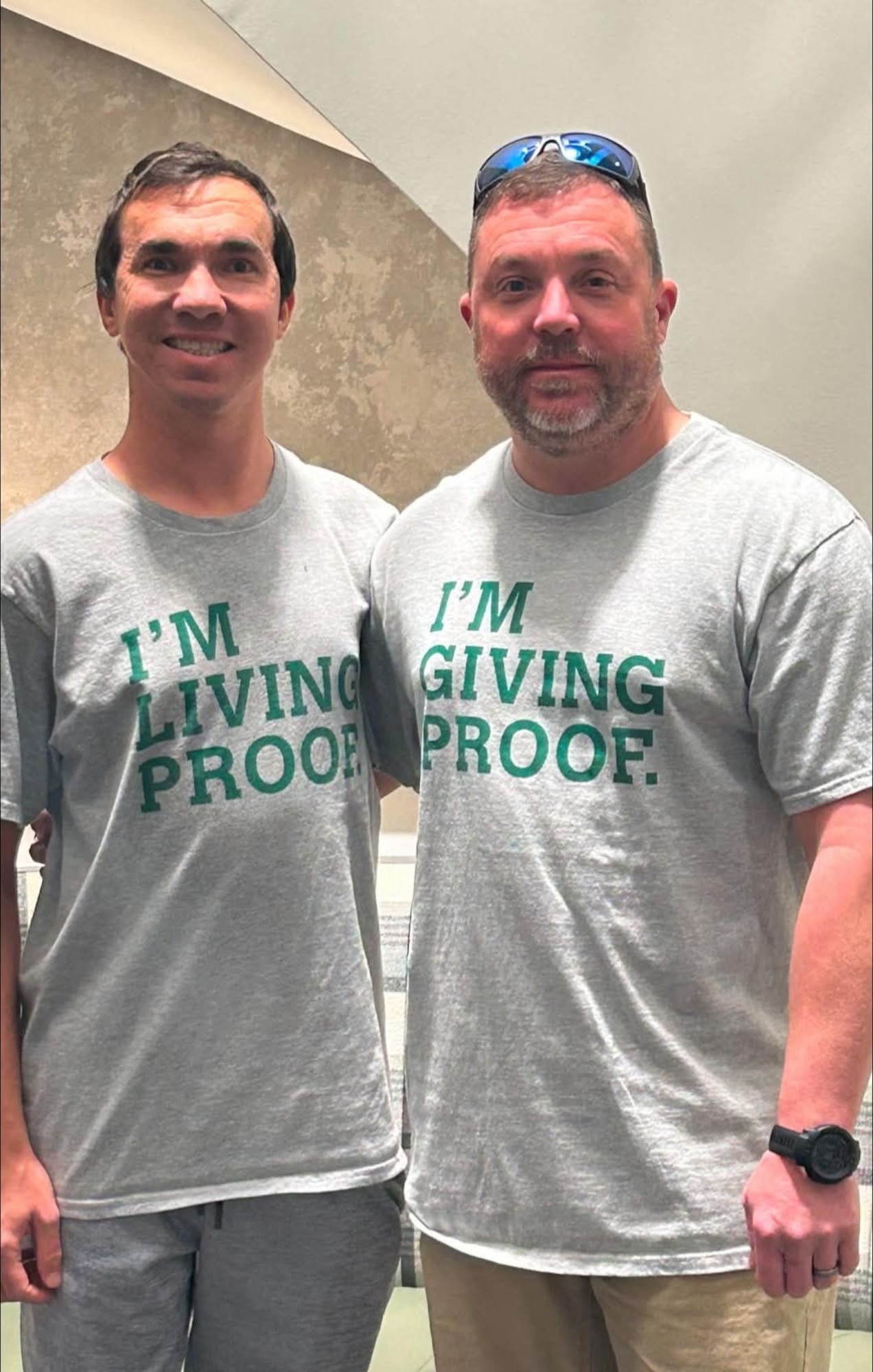 Master Sgt. Ron Bohl (right) and his brother, Matthew, share a smile after a successful three-week checkup, marking a major milestone in Matthew's recovery from a kidney transplant, which was made possible by a paired donor program at the University of Alabama at Birmingham. After Ron Bohl, a Mississippi Air National Guardsman, was found not to be a match for his brother Matthew, he received a kidney from another donor in a successful kidney swap (photo provided by Master Sgt. Ron Bohl)