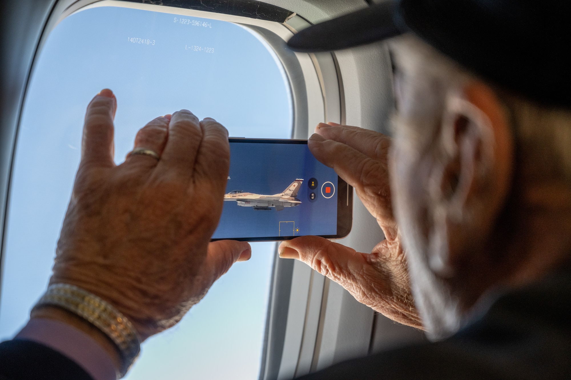 Retired colonel takes picture of airplane