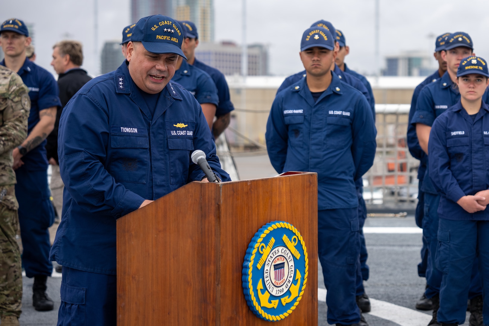 U.S. Coast Guard Vice Adm. Andrew Tiongson, Pacific Area commander, speaks at a press conference aboard the Coast Guard Cutter Waesche in San Diego, Feb. 13, 2025. The Waesche’s crew offloaded drugs interdicted in the Eastern Pacific during counter-narcotic patrols, eliminating 37,256 pounds of cocaine worth an estimated $275 million in value. (U.S. Coast Guard photo by Petty Officer 3rd Christopher Sappey)