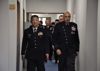 U.S. Space Force Lt. Gen. David N. Miller Jr., right, commander of U.S. Space Operations Command (SpOC), speaks with members of the Japanese Air Self-Defense Force’s Space Operations Group at Fuchu Air Base, Japan, Feb. 10, 2025.