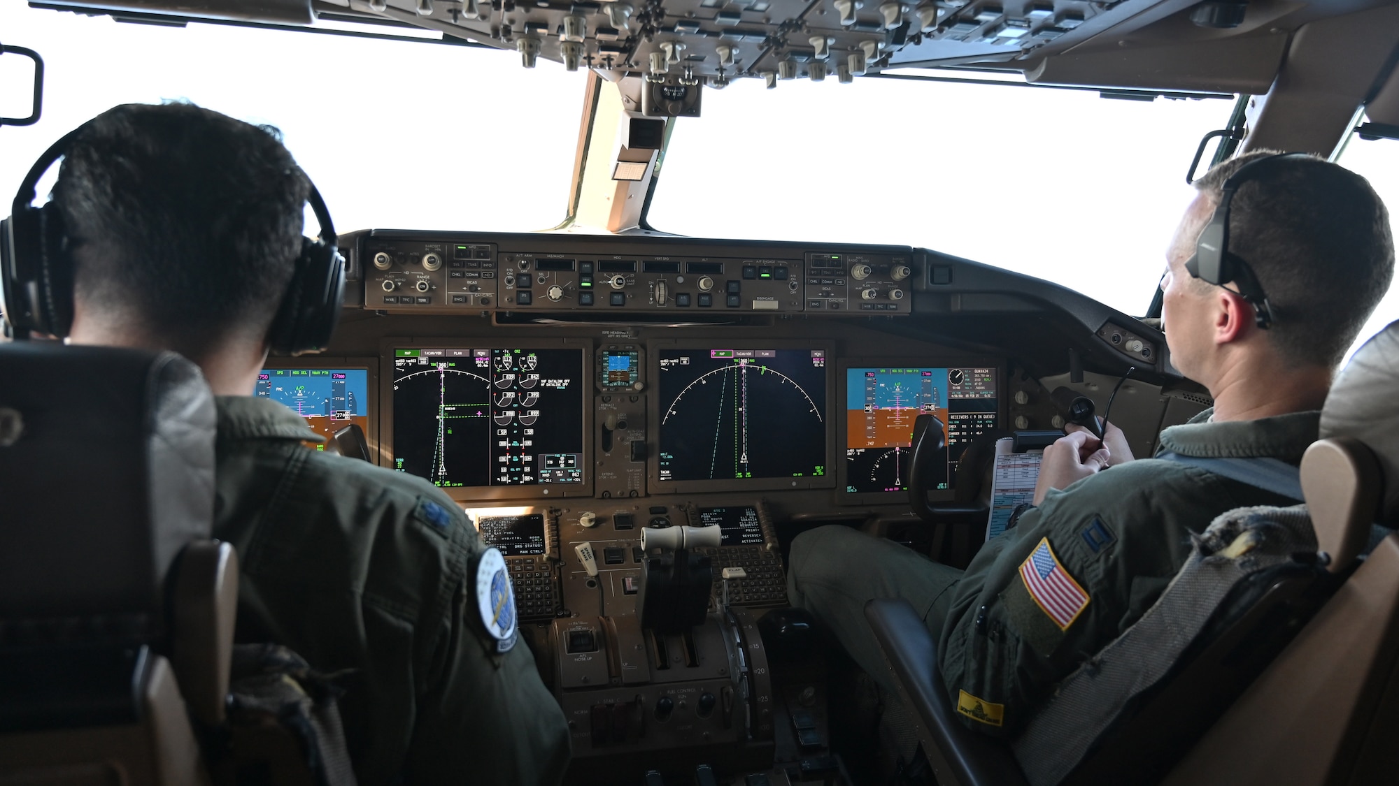 (Left to right) Lt. Col. Leo Romero, 924th Air Refueling Squadron pilot, Capt. Daniel Kinnamon, 924th ARS co-pilot, fly over the skies of Guam on the first day of Exercise Cope North 2025 (CN25, Feb. 5, 2025.