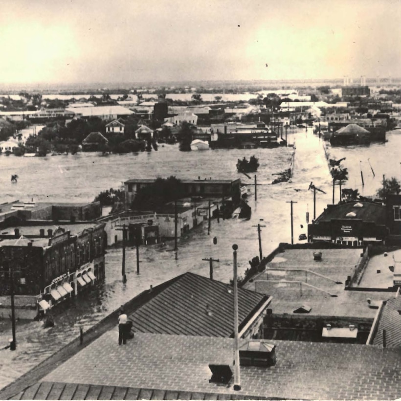 An aerial view of San Angelo during the floods of September 1936. This flood, and others like it over the previous decade, led to the authorization of O.C. Fisher Dam and Lake by the Flood Control Act of 1941. Since its completion, through fiscal year 2023, the cumulative amount of damages prevented by the dam during rain events is $21.3 million.