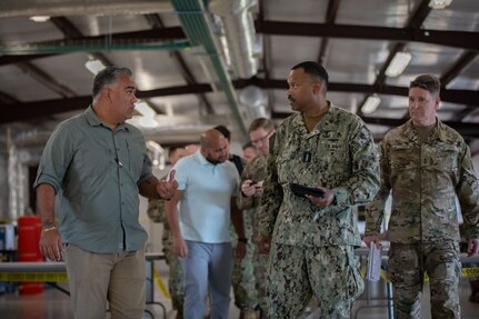 Admiral Holsey visits illegal aliens holding operations center at Guantanamo Bay
