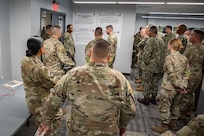 Admiral Holsey visits illegal aliens holding operations center at Guantanamo Bay