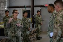 Admiral Holsey visits illegal aliens holding operations center at Guantanamo Bay