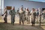 Admiral Holsey visits illegal aliens holding operations center at Guantanamo Bay