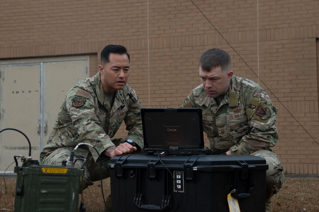 Airmen set up radio equipment