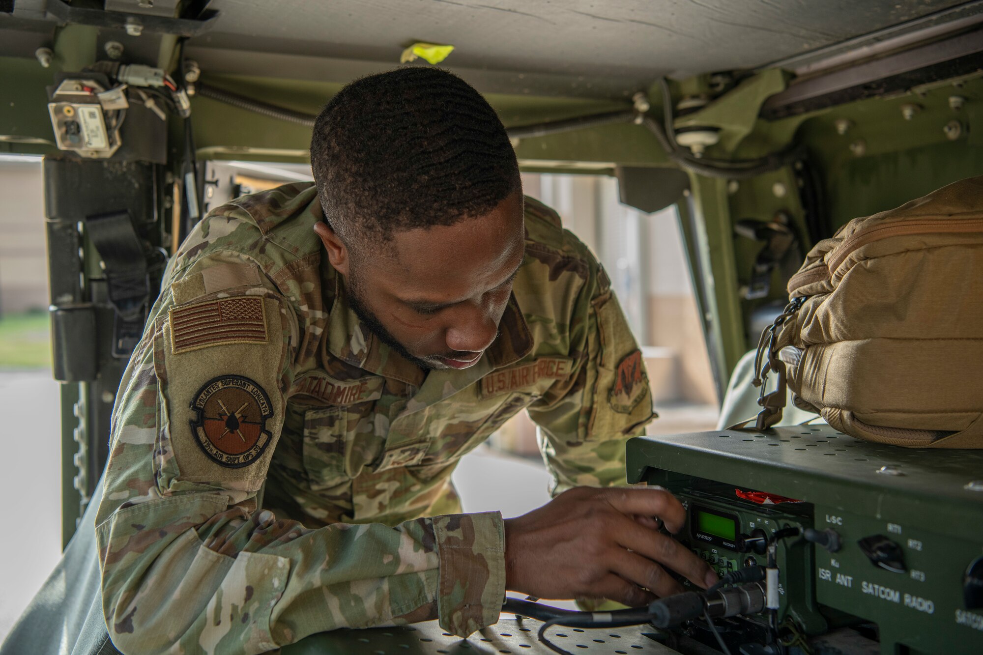 Airman sets up radio equipment