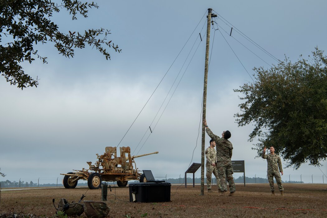 Airmen set up antenna