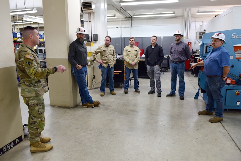 U.S. Army Corps of Engineers Command Sgt. Maj. Douglas Galick talks with employees Feb. 11, 2025, at the Wolf Creek Dam Powerhouse on the Cumberland River in Jamestown, Kentucky. Galick takes back information to USACE Headquarters about the challenges or issues raised by employees during his visits. (USACE Photo by Lee Roberts)