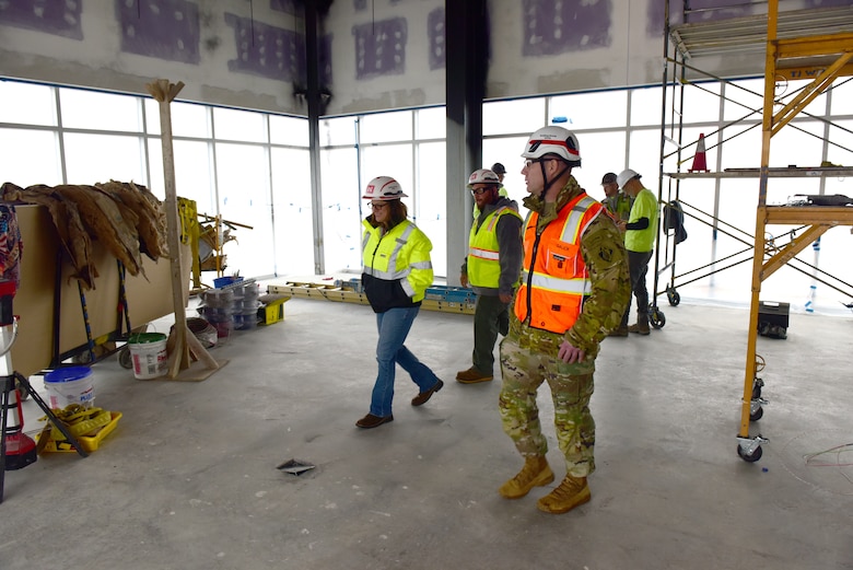 Jackie Huff (Left), U.S. Army Corps of Engineers Nashville District Eastern Tennessee Resident Office chief, leads Command Sgt. Maj. Douglas Galick on a tour Feb. 12, 2025, of ongoing construction of the K-25 Viewing Platform Building at East Tennessee Technology Park in Oak Ridge, Tennessee. The Nashville District is managing construction for the U.S. Department of Energy’s Oak Ridge Office of Environmental Management. The building will provide a historic lookout over the footprint of where the K-25 Building once stood, and the Oak Ridge Diffusion Plant produced uranium during World War II as part of the Manhattan Project. (USACE Photo by Lee Roberts)