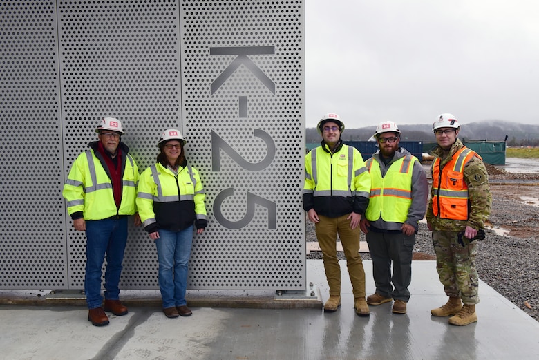 U.S. Army Corps of Engineers Command Sgt. Maj. Douglas Galick (red safety vest) poses with USACE employees with the Nashville District during a tour Feb. 12, 2025, of ongoing construction of the K-25 Viewing Platform Building at East Tennessee Technology Park in Oak Ridge, Tennessee. The Nashville District is managing construction for the U.S. Department of Energy’s Oak Ridge Office of Environmental Management. The building will provide a historic lookout over the footprint of where the K-25 Building once stood, and the Oak Ridge Diffusion Plant produced uranium during World War II as part of the Manhattan Project. (USACE Photo by Lee Roberts)