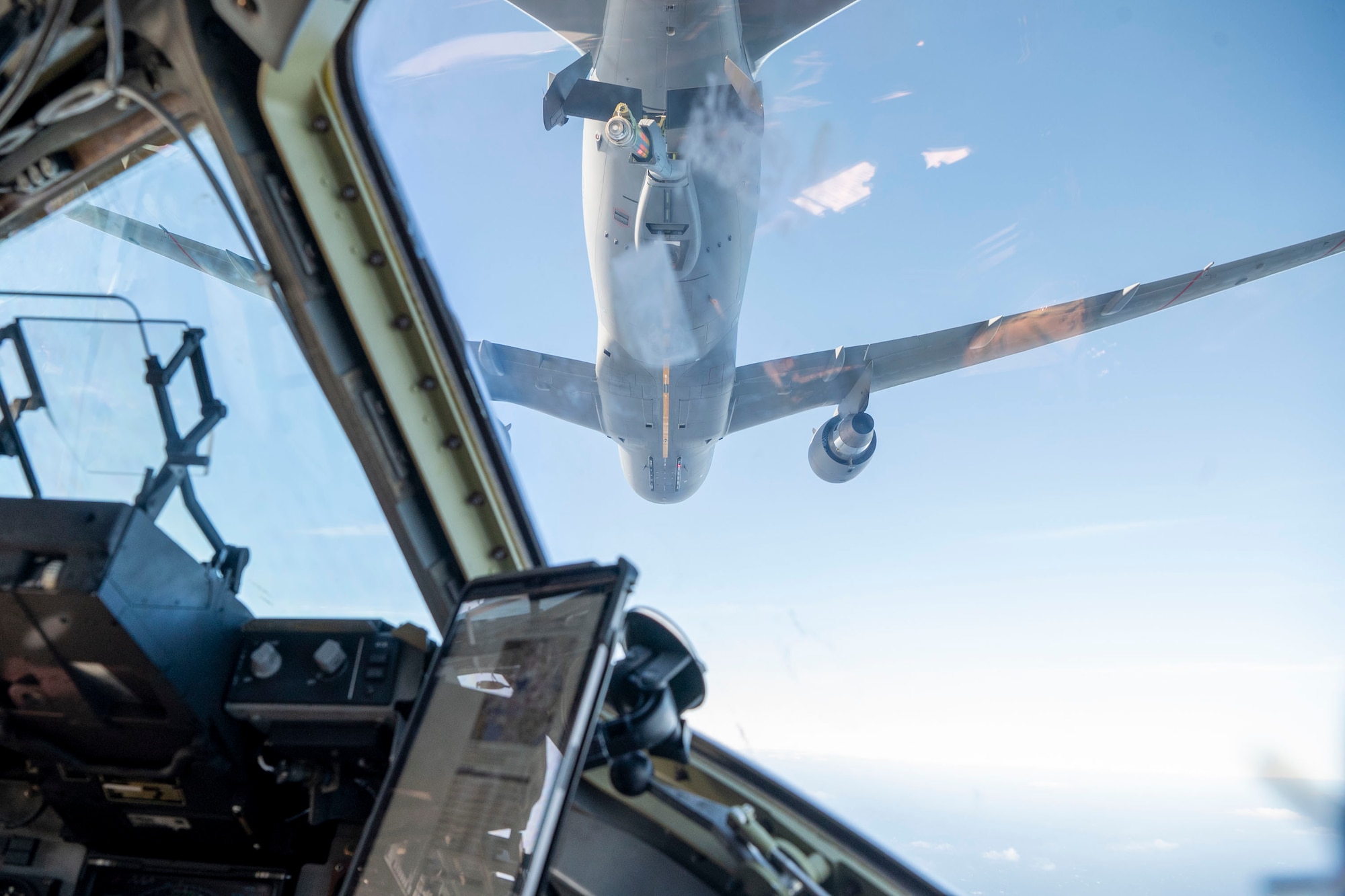 A KC-46 Pegasus assigned to the 305th Air Mobility Wing from Joint Base McGuire-Dix-Lakehurst conducts low-altitude aerial refueling with a C-17 Globemaster III assigned to the 7th Expeditionary Airlift Squadron at Joint Base Lewis-McChord, Washington, during Bamboo Eagle 25-1 in the Pacific region, Feb. 11, 2025.