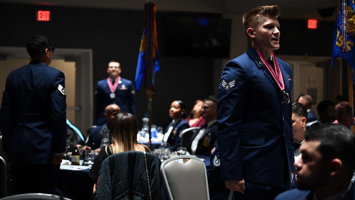 U.S. Air Force Senior Airman Peter Surette, Airman Leadership School Class 25-B graduate, stands to recite the Airman’s Creed during the ALS Class 25-B graduation at the Powell Event Center, Goodfellow Air Force Base, Texas, Feb. 13, 2025. ALS focuses on developing leadership abilities, the profession of arms, and building effective communication. (U.S. Air Force photo by Senior Airman Madi Collier)