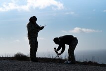 Airmen set up antenna