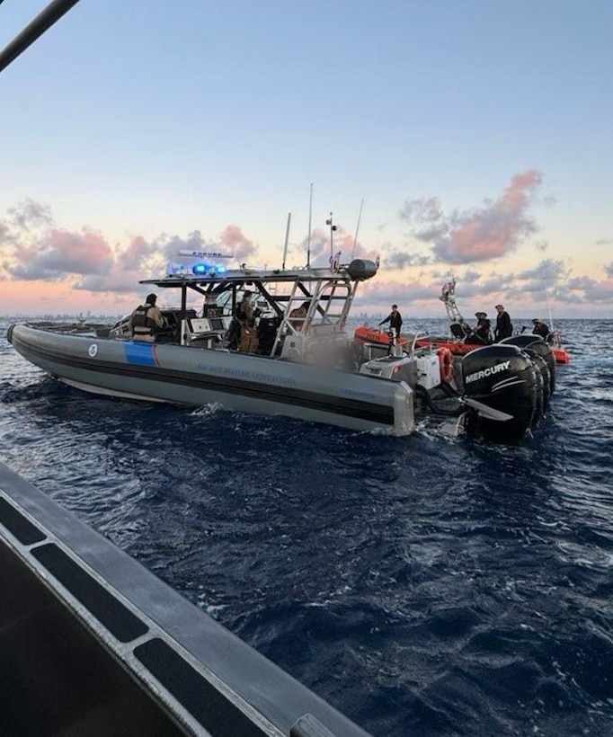 Customs and Border Protection Air and Marine Operations and Coast Guard boat crews interdicting a suspected smuggling venture in U.S. territorial waters, Feb. 9, 2025. Two on board were transferred to Homeland Security Investigations and the remaining 20 aliens were returned to The Bahamas. (U.S. Coast Guard photo)