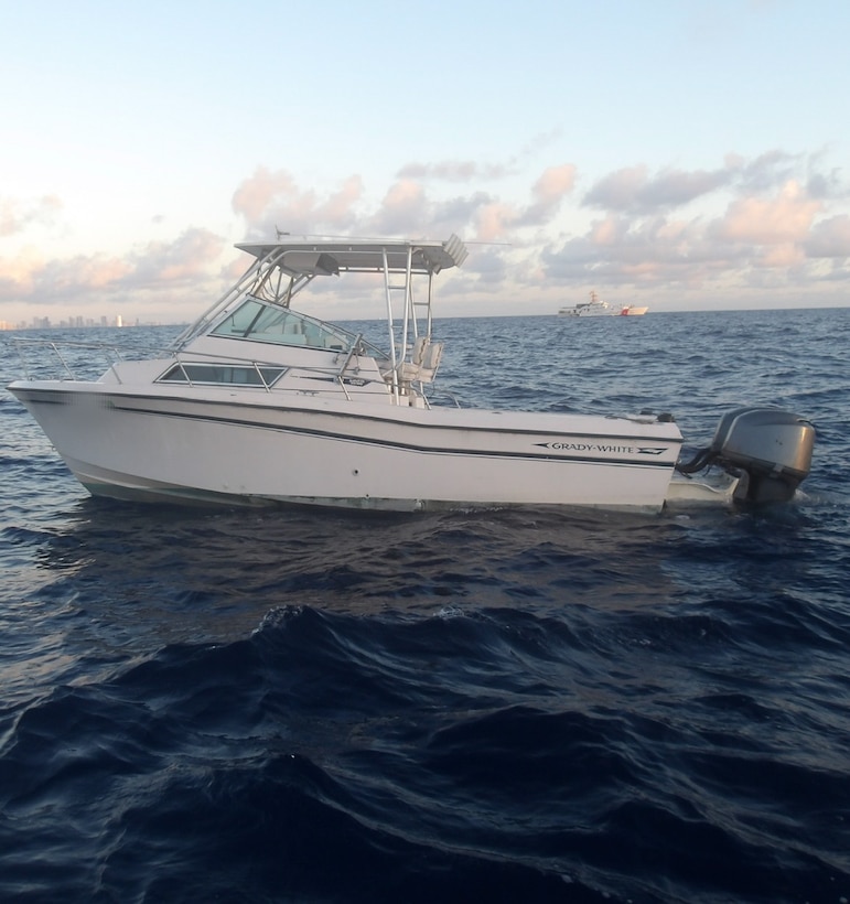 Customs and Border Protection Air and Marine Operations and Coast Guard boat crews interdicting a suspected smuggling venture in U.S. territorial waters, Feb. 9, 2025. Two on board were transferred to Homeland Security Investigations and the remaining 20 aliens were returned to The Bahamas. (U.S. Coast Guard photo)