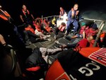 Coast Guard Station Miami Beach boat crews embarking aliens from a suspected smuggling venture in the Florida Straits, Feb. 12, 2025. One suspected smuggler was transferred to Homeland Security Investigations custody and the remaining 11 aliens were transferred to The Bahamas. (U.S. Coast Guard photo)