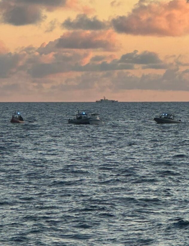 Customs and Border Protection Air and Marine Operations and Coast Guard boat crews interdicting a suspected smuggling venture in U.S. territorial waters, Feb. 9, 2025. Two on board were transferred to Homeland Security Investigations and the remaining 20 were returned to The Bahamas. (U.S. Coast Guard photo)