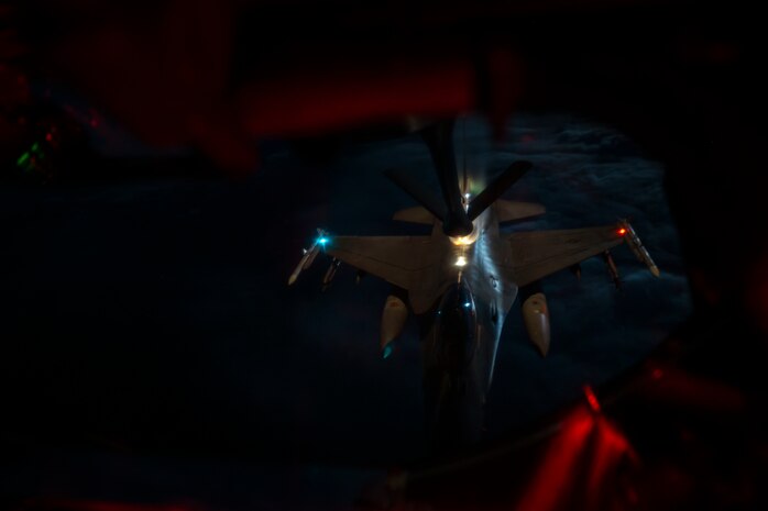 airplane being refueled