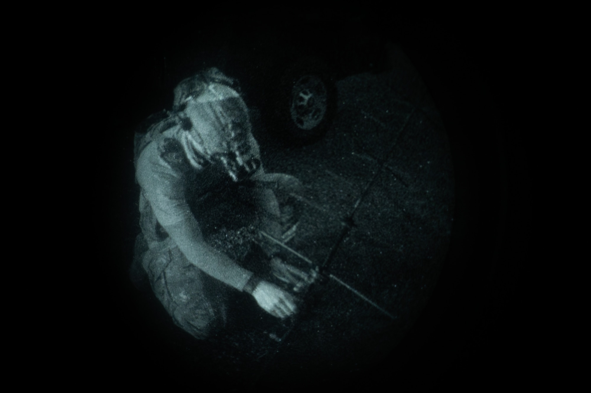 Airman adjusts antenna