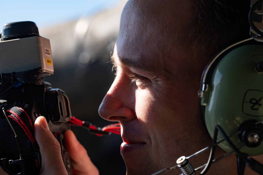 U.S. Army Staff Sgt. Kyler Moise, Joint Task Force-Bravo Civil Affairs Company geospatial engineer specialist, takes photos of the terrain of areas around Soto Cano Air Base, Honduras, during the Automated Route Reconnaissance Kit training February 6, 2025. The member that is controlling the camera, captures images that has GPS data correlated with the images that then gets routing to a computer. (U.S. Air Force photo by Staff Sgt. Tristan Biese)