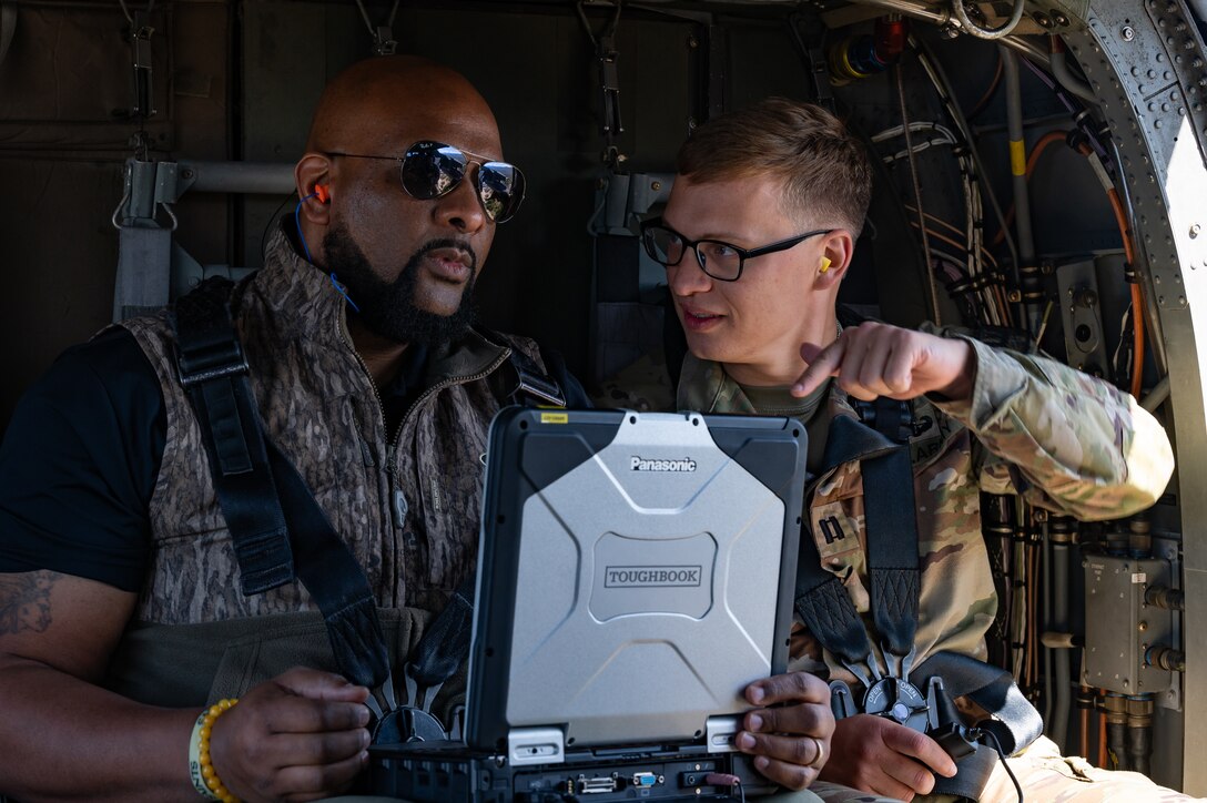Reginald McCoy, U.S. Army Corps of Engineers Engineer Research and Development Center emergency operations specialist, trains U.S. Army 1st Lt. Micah Feltenstein, Joint Task Force-Bravo engineering directorate (J7) project officer, how to utilize the computer that displays the terrain during the Automated Route Reconnaissance Kit training at Soto Cano Air Base, Honduras, February 6, 2025. According to the ERDC from the USACE, compared to traditional route reconnaissance techniques, soldiers and first responders can reduce time, minimize security risks and acquire quantitative data sets in order for commanders and stakeholders to make informed decisions. (U.S. Air Force photo by Staff Sgt. Tristan Biese)