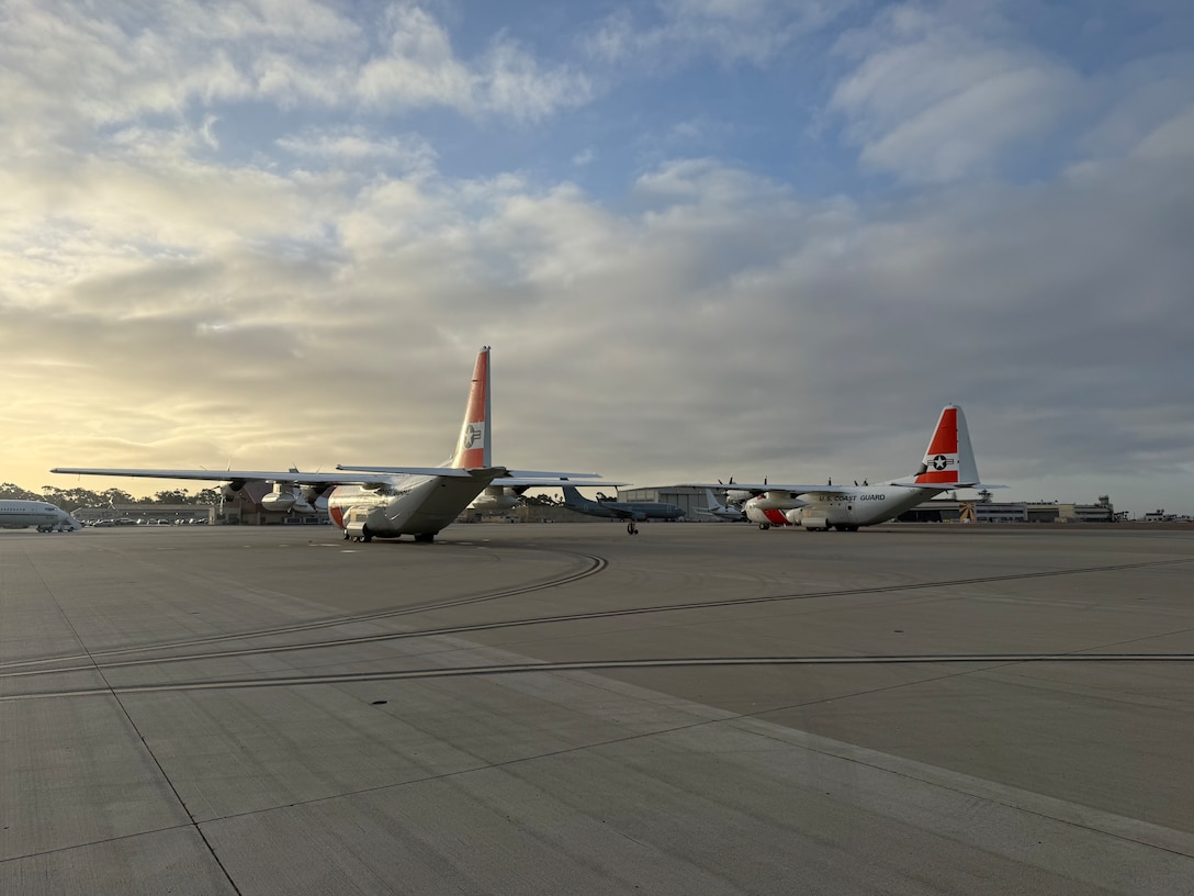 Two U.S. Coast Guard C-130 Hercules prepare for an alien expulsion flight, Feb. 15, 2025.