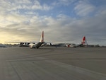 Two U.S. Coast Guard C-130 Hercules prepare for an alien expulsion flight, Feb. 15, 2025.