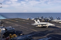 250215-N-UQ809-1633 MEDITERRANEAN SEA (Feb. 15, 2024) An F/A-18E Super Hornet, attached to the “Pukin' Dogs” of Strike Fighter Squadron (VFA) 143, lands on the flight deck of the Nimitz-class aircraft carrier USS Harry S. Truman (CVN 75) Feb. 15. USS Harry S. Truman, the flagship of the Harry S. Truman Carrier Strike Group (HSTCSG), is on a scheduled deployment in the U.S. 6th Fleet area of operations supporting U.S. Naval Forces Europe-Africa to defend U.S., Allied and partner interests. (U.S. Navy photo by Mass Communication Specialist Seaman Apprentice Mekhi Manson)