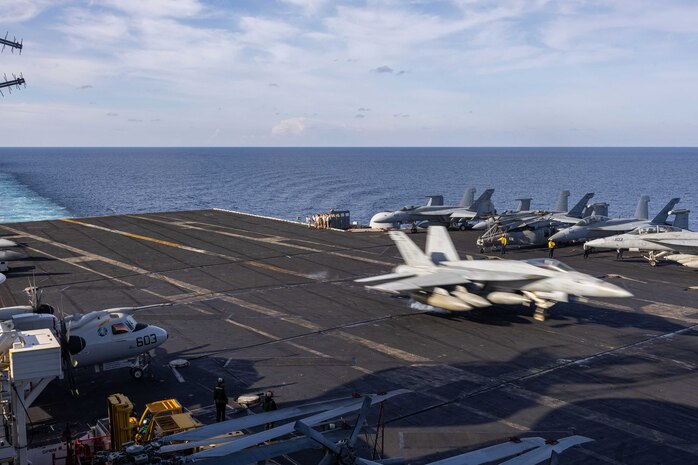 250215-N-UQ809-1633 MEDITERRANEAN SEA (Feb. 15, 2024) An F/A-18E Super Hornet, attached to the “Pukin' Dogs” of Strike Fighter Squadron (VFA) 143, lands on the flight deck of the Nimitz-class aircraft carrier USS Harry S. Truman (CVN 75) Feb. 15. USS Harry S. Truman, the flagship of the Harry S. Truman Carrier Strike Group (HSTCSG), is on a scheduled deployment in the U.S. 6th Fleet area of operations supporting U.S. Naval Forces Europe-Africa to defend U.S., Allied and partner interests. (U.S. Navy photo by Mass Communication Specialist Seaman Apprentice Mekhi Manson)