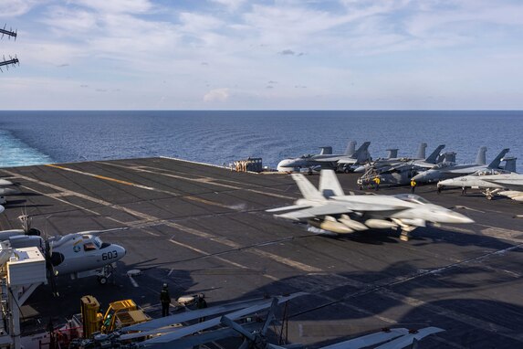 250215-N-UQ809-1633 MEDITERRANEAN SEA (Feb. 15, 2024) An F/A-18E Super Hornet, attached to the “Pukin' Dogs” of Strike Fighter Squadron (VFA) 143, lands on the flight deck of the Nimitz-class aircraft carrier USS Harry S. Truman (CVN 75) Feb. 15. USS Harry S. Truman, the flagship of the Harry S. Truman Carrier Strike Group (HSTCSG), is on a scheduled deployment in the U.S. 6th Fleet area of operations supporting U.S. Naval Forces Europe-Africa to defend U.S., Allied and partner interests. (U.S. Navy photo by Mass Communication Specialist Seaman Apprentice Mekhi Manson)
