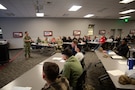 U.S. Navy Chief Petty Officer Damage Controlman Chase Hunter, Joint Task Force Civil Support Chemical, Biological, Radiological, Nuclear safety officer, briefs U.S. Army Soldiers assigned to the 172nd Chemical Company, 2nd Chemical Battalion, 48th Chemical Brigade, 20th Chemical, Biological, Radiological, Nuclear, Explosives Command, Fort Riley, Kansas, Feb. 8, 2025, at Camp Talega, Calif. Soldiers of the 172nd Chemical Co., along with other Department of Defense assets, are supporting Federal Emergency Management Agency and the Environmental Protection Agency wildfire hazardous waste cleanup operations around the Los Angeles County area in California as part of U.S. Northern Command’s assigned Defense Support of Civil Authorities. At the request of the FEMA, NORTHCOM deployed approximately 170 active-duty personnel to assist EPA led teams with cleanup of wildfire hazardous waste from the Eaton and Palisades fires in California. U.S. Army North, NORTHCOM’s Joint Force Land Component Command, is overseeing the military’s support to federal and state efforts, while JTF-CS is providing on-the-ground command and control of active-duty personnel. Work to remove the hazardous materials is phase 1 of the federal cleanup response to ensure the safety of the residents by preventing these materials from being released into the environment.