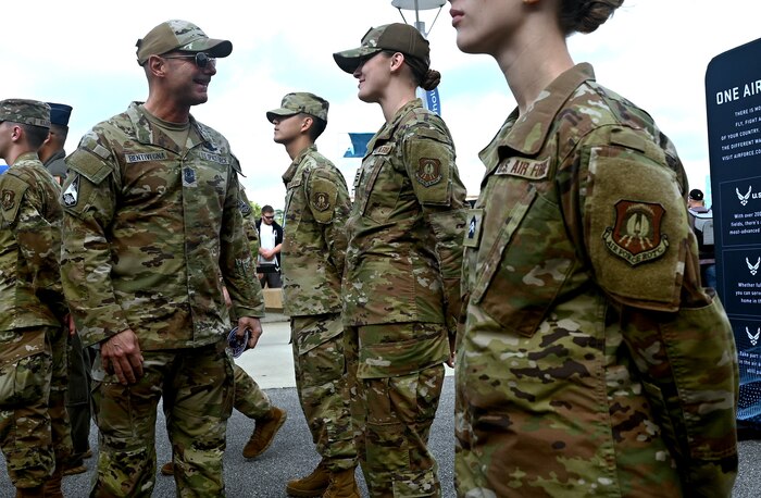 Military leader talks with cadets.