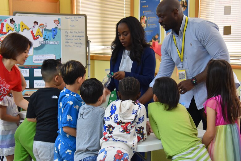 Photo of kids and volunteers