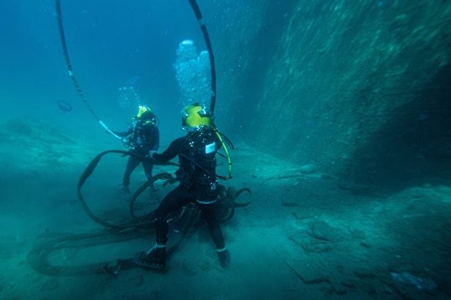 U.S. and Royal Jordanian Navy divers participate in a surface supplied dive during International Maritime Exercise (IMX) 2025 in Aqaba, Jordan, Feb. 15. IMX25 is the largest multinational training event in the Middle East, involving 5,000 personnel from around 30 nations and international organizations committed to preserving the rules-based international order and strengthening regional maritime security cooperation. (U.S. Navy photo by Navy Diver 1st Class David McMahan)