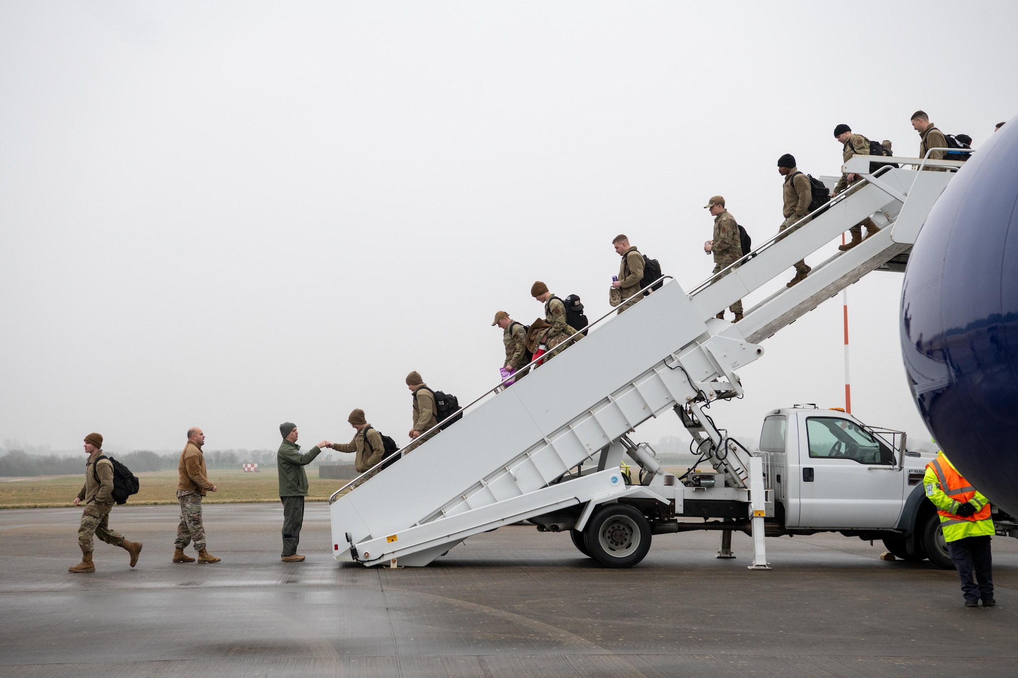 Airmen exit an Atlas Air Boeing 767 aircraft